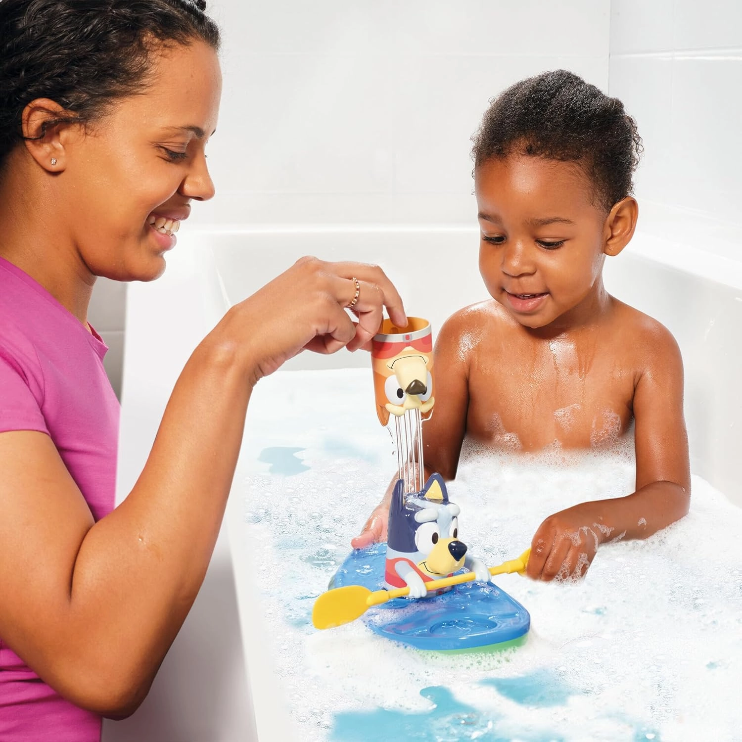 TOMY Toomies Bluey Pull and Go Canoe - Pull String Helps Bluey Paddle Through Water - Includes Bingo Bath Toy Pourer - Bluey Toys for Bath - Ages 18 Months and Up